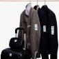 Preview: Bedruckte selbstklebende Garderobenmarke Garderobenticket 3-teilig an Koffer, Jacke und mit Gästeabschnitt